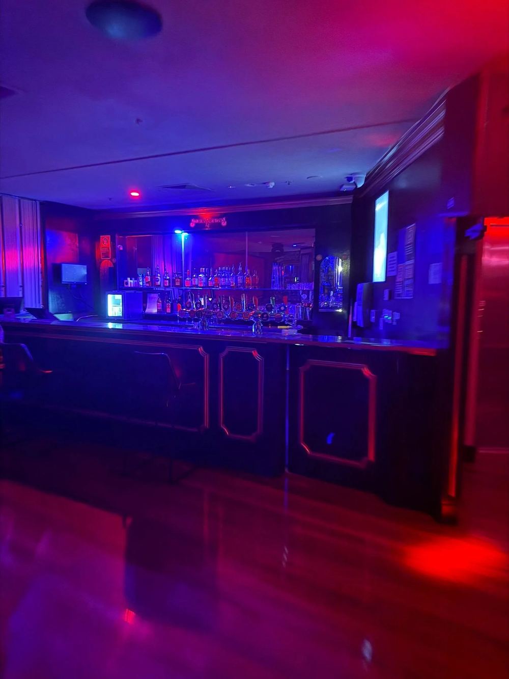 The back bar and its bottle display