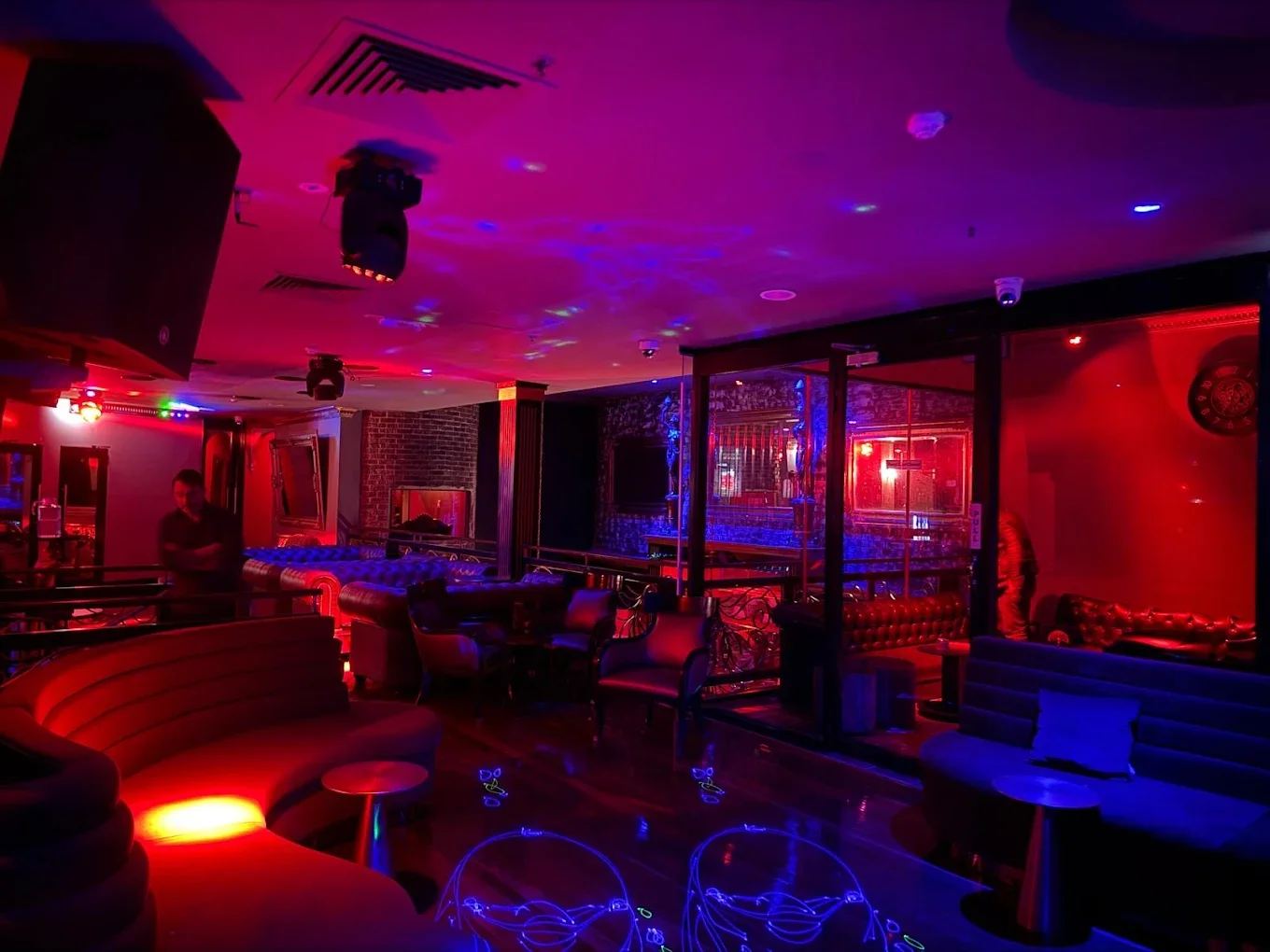 The lounge with its seating lit in colour