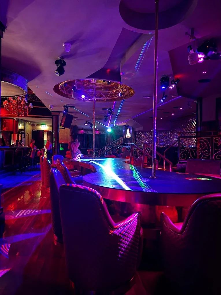 The main room with the stage and bar behind