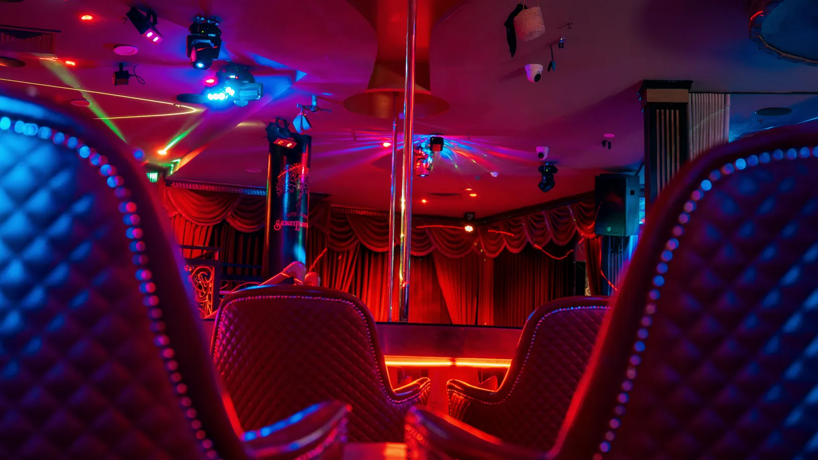 Club chairs and a low table near the entrance